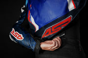 Detail of 4SR RR Blue AR racing jacket zipped securely to Tourismo Black motorcycle jeans for full riding safety and comfort.