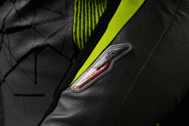 4SR racing suit forearm panel prepared for Tech-Air® airbag vest LED connection – Airbag Ready detail