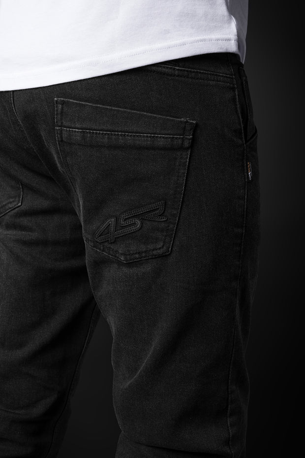 4SR GTS Black motorcycle jeans rear pocket close-up showing embroidered 4SR logo and Cordura denim label