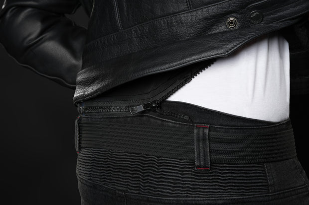 4SR GTS Black motorcycle jeans connected to leather jacket via short waist zipper showing flexible waistband