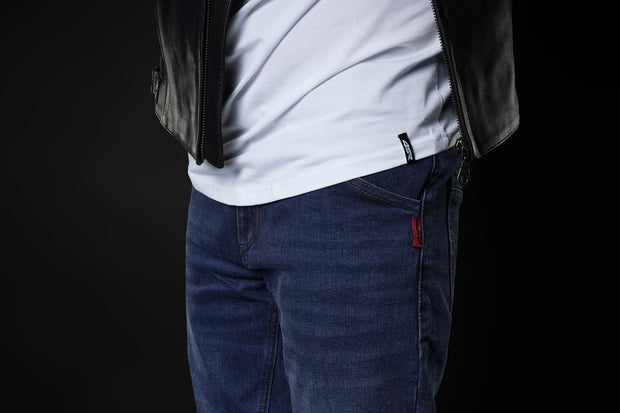 4SR GTS Blue motorcycle jeans front detail under leather jacket, showing clean seam and red 4SR tag