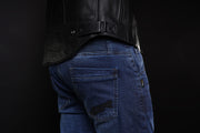 4SR GTS Blue motorcycle jeans angled rear view highlighting ergonomic cut, flex panels, and clean denim finish