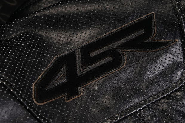 Detail of 4SR Scrambler Petroleum II jacket back logo stitched on perforated leather panel