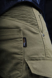Close-up of 4SR Tourismo Green motorcycle jeans with Cordura® Denim label and reinforced stretch panels