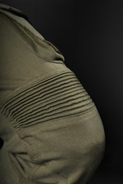 Close-up of knee stretch panel on 4SR Tourismo Green motorcycle jeans for flexibility and comfort while riding